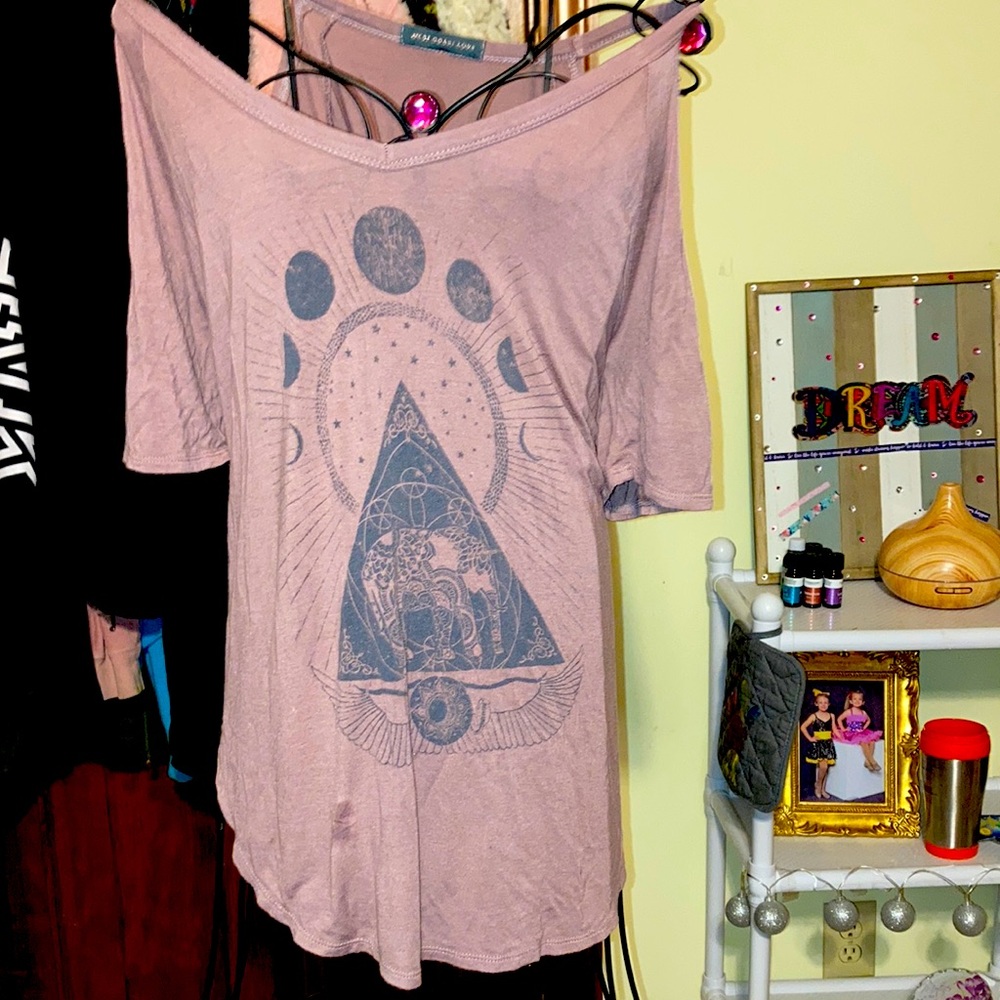 Women’s size Large by: West Coach Love